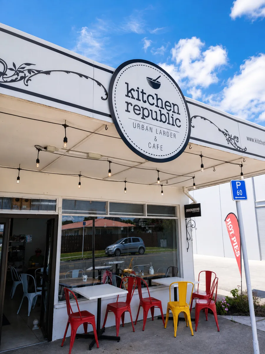 Kitchen Republic Cafe storefront sign and outdoor seating
